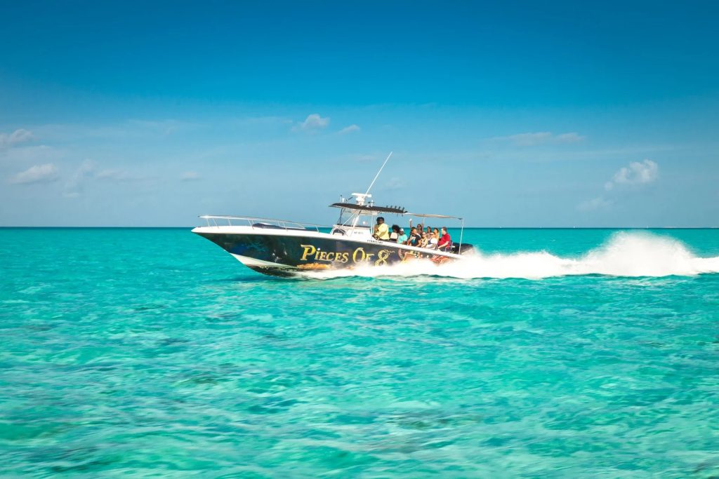 Discover the Delicate Pink Sands by a Serene Harbour